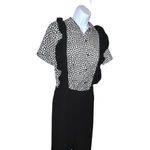 Black Women's Jumpsuit shown with top underneath ( sold separately) Size undefined Photo 2