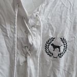 PINK Victoria's Secret tie up lace neckline pink on sleeves short sleeve shirt in white and black size large. Photo 3