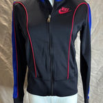 Nike Women's Varsity Jacket in Black with Blue and Pink Highlights Photo 0