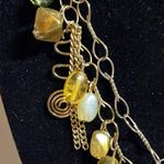 Charm necklace with earth, tone beads Brown Photo 2