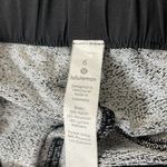 Lululemon On The Fly Pant *28" size 6
Feathered Jacquard Black White / Black Photo 6