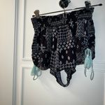 Surf Gypsy Black shorts with white designs and light blue strings in the bottom Photo 1