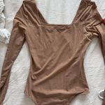 Quince Square Body Suit Photo 0