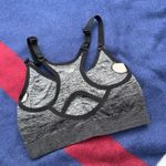 New Balance  Grey and black sports bra
Fits like a women’s size XS/S Photo 1