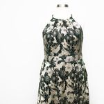 Betsy and Adam . Layla Halter Top Foil Print Gown. Photo 9