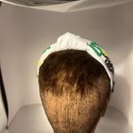 Headband absolutely gorgeous. It appears to be a Mardi Gras.​ Photo 2