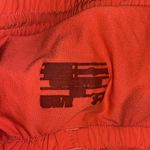 Under Armour Neon Coral Orange Activewear Athletic Shorts Women's Size XL Photo 4