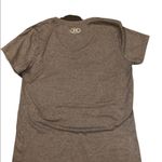 Under Armour  v-neck short sleeved women’s shirt size medium Photo 1