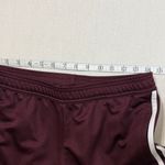 Adidas  Maroon Track Pants with White Stripes Photo 4