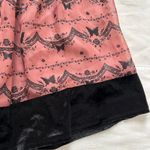 axes femme Pink and black butterfly mini skirt with a touch of fairy charm Size M Photo 1