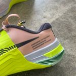 Nike Pink and Lime Green Metcons Photo 3