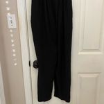 The Editor’s Market Moll V-Neck Jumpsuit in Black Photo 13