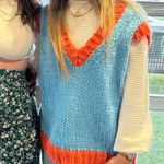 Orange And Blue Sweater Vest Photo 0
