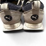 Puma Rider FV Retro Rewind sneakers in a white and grey colorway Photo 2