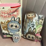 Authenticated POP MART Exciting Macaron Vinyl Labubu Photo 0