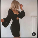 NWOT Cut Out Mini Dress with Sheer Balloon Long Sleeves Black Photo 1