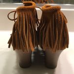 Minnetonka Women’s Leather Suede Moccasin Fringe Tassel Lace-Up Wedge Booties Photo 3