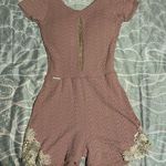 EUC BH Sete Pink and White Floral Lace Romper with Tie Back size small Photo 0