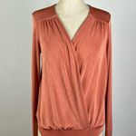 Free People Turnt Bodysuit in Ginger Spice Photo 1