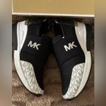 Michael Kors womens Felix Trainer black and white Photo 1