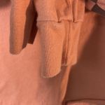 Vans  XS long sleeve crop top logo shirt on peachy tone. Photo 4