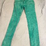 Free People Teal Green Corduroy Skinny Jeans. Photo 1