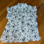 Adiva Black and White Ruffled Sleeveless Blouse Photo 0