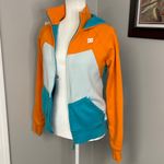 DC Women's Vibrant Orange and Teal Jacket hooded sweatshirt size Medium Photo 1