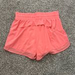 Athleta neon coral orange High Rise Mesh Racer Run 3" shorts size M Photo 2