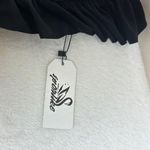 Chic Black Ruffled One Photo 1