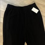 Boutique NWT Black Flared gauzy cotton Pants medium Photo 2