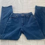 Wrangler cowboy cut jeans in medium wash. Photo 1