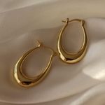 Boutique  Thick Gold Hoop Oval Earrings Photo 0