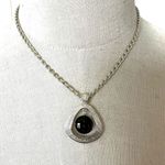 é silver tone and purple teardrop pendant necklace Silver Photo 2
