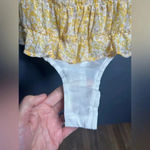 Lulus  Sweetest Frills Yellow Print Tie-Strap
Smocked Bodysuit Photo 6