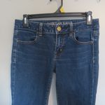 American Eagle  Outfitters super stretch jegging jeans in dark wash blue size 2. Photo 1