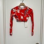 Athleta | NWT Waimea Red Floral Rush Guard Long Sleeve Twist Crop Swim Top, XXS Photo 1