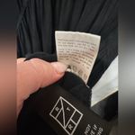 Isabel Maternity  by Ingrid & Isabel Black Handkerchief Hem top size small Photo 8