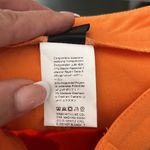 SheIn orange pants with hip cut out Photo 6