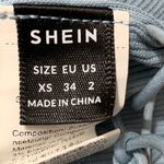 SHEIN Blue Ribbed Knit Handkerchief Hem Crop Top Size XS Crisscross Back Spaghet Photo 2