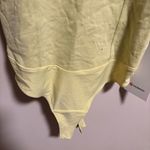 Lululemon NWT  Heavyweight Cotton T-Shirt Bodysuit
Finch Yellow- Size Small Photo 8