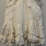 Urban Outfitters  Cream Eyelet Ruffle Mini Dress - Size Medium NWT Photo 2