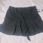 Soho Apparel $30  LTD New York black silky smooth skirt & short 4 WAY STRETCH NWT MAXIMUM COMFORT MOBILITY New with tag  Same day shipping  Smoke and pets free Photo 1