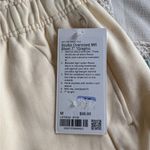 Lululemon NWT  Scuba Mid-Rise Oversized Short 7" Graphic
Medium
Butter cream Photo 2