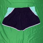 Nike Women's Purple and Mint Dri-Fit Athletic Shorts size Large Photo 1
