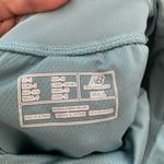 New Balance  blue lined shorts size small Photo 2