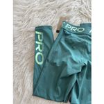 Nike  Pro Mid-Rise 7/8 Graphic Leggings Bicoastal Vapour Green White Size Small Photo 8