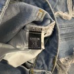 SheIn Flower Jeans Photo 2