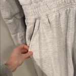 Free People training day light grey jumpsuit with half zip and baggy fit Photo 5