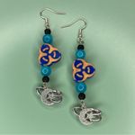 Blue and Light Orange Biohazard Symbol Earrings with Dangling Moon Charms Photo 2